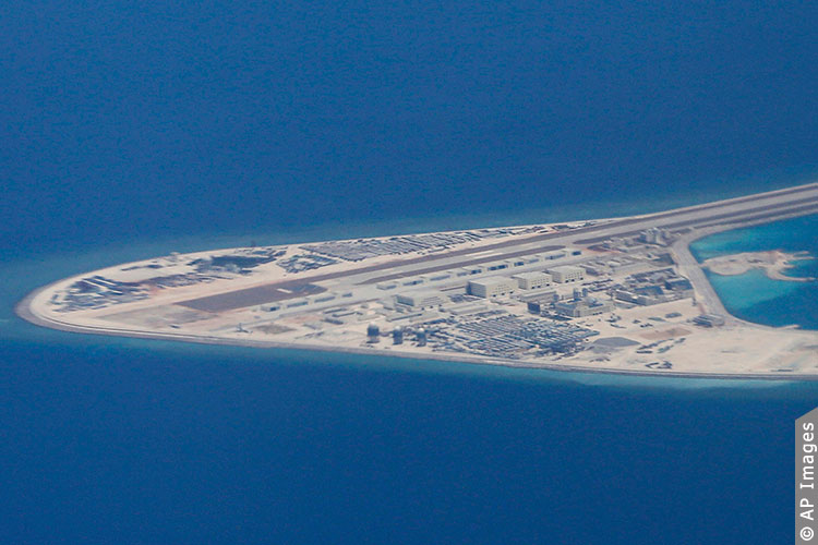 China’s man-made Subi Reef with Chinese military base in the South China Sea, as seen from a Philippine Air Force plane. Photo – Bullit Marquez © AP Images